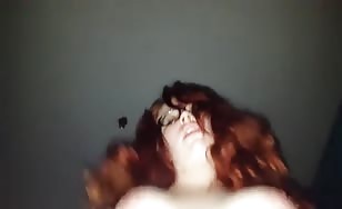 Busty redhead loves to ride